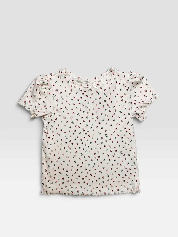 Remera blanca c/florcitas h&m