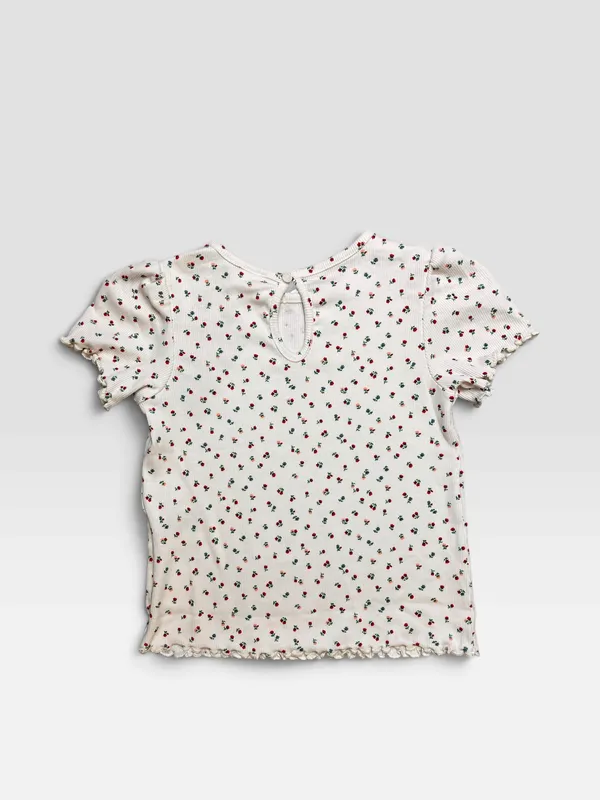 Remera blanca c/florcitas h&m
