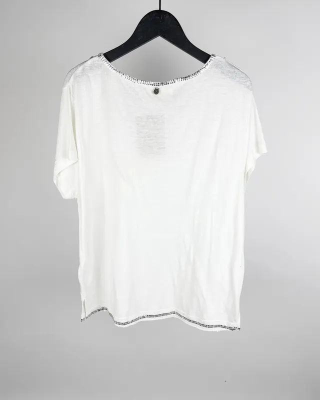 Remera bordada rapsodia