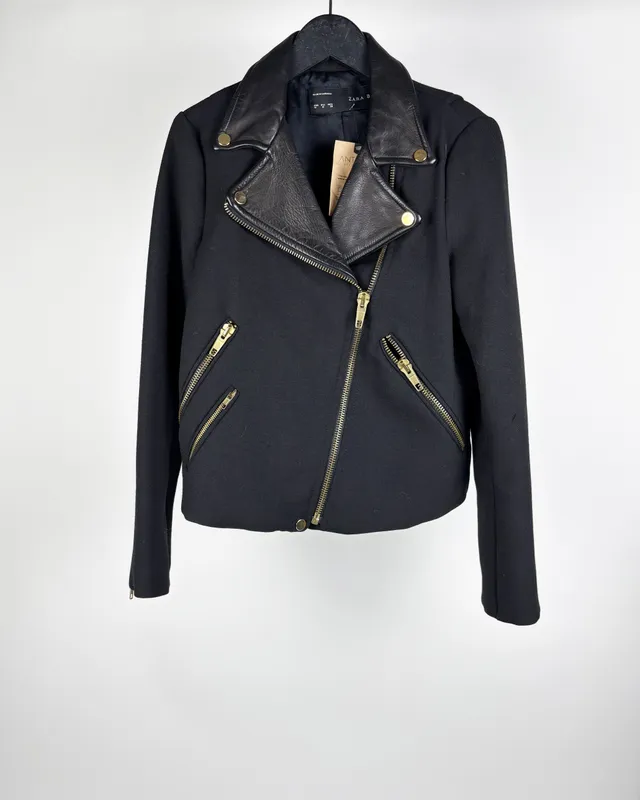 Campera negra con cuero zara