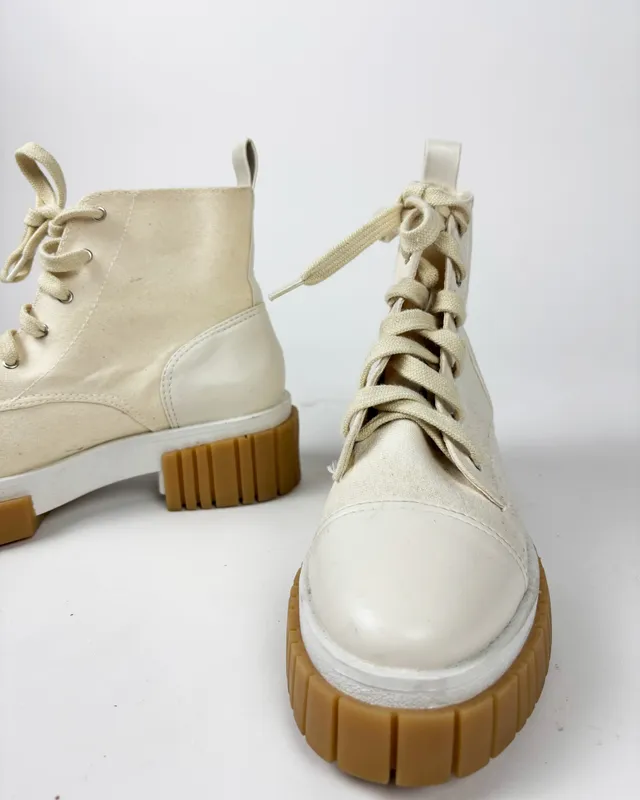 Borcegos arena lona saura