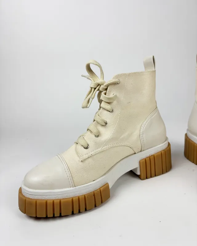 Borcegos arena lona saura