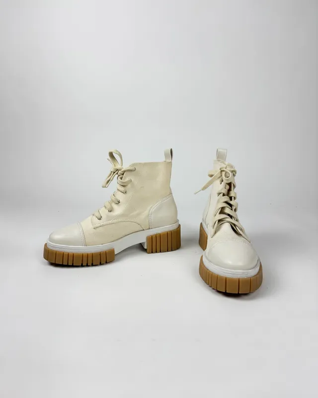 Borcegos arena lona saura