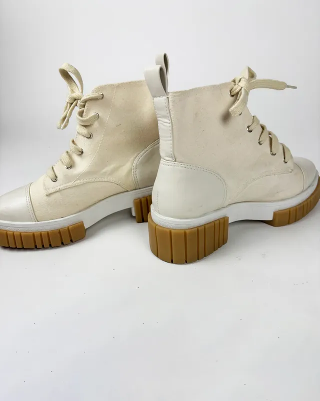 Borcegos arena lona saura