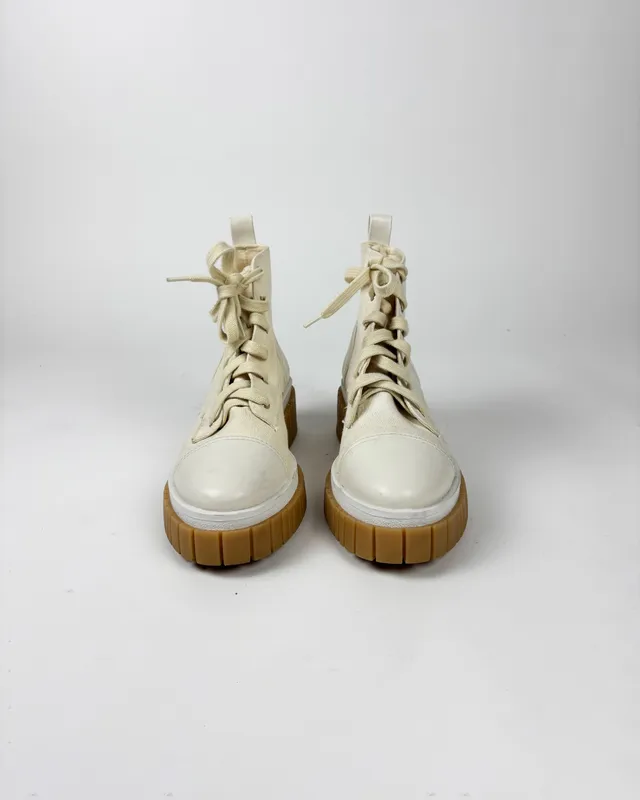 Borcegos arena lona saura