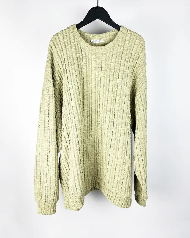 Buzo verde claro texturado zara