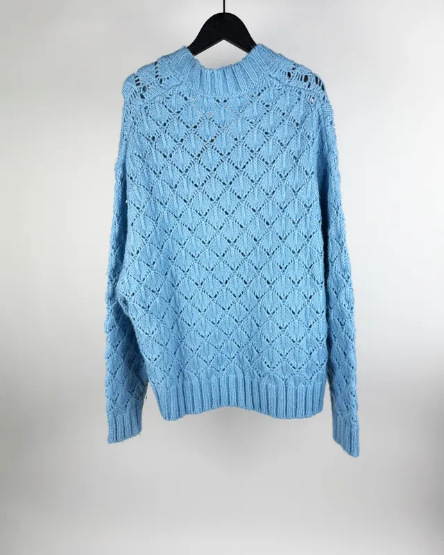 Buzo tejido celeste zara