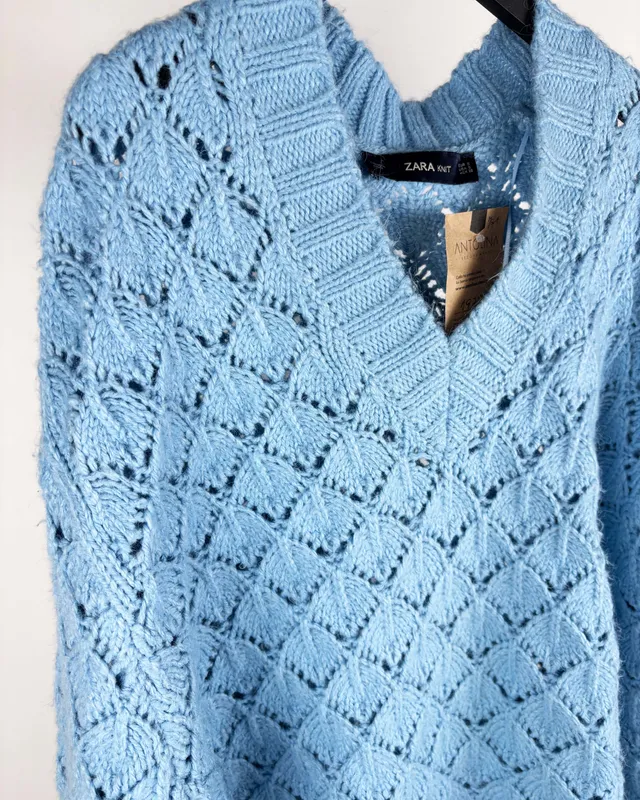 Buzo tejido celeste zara