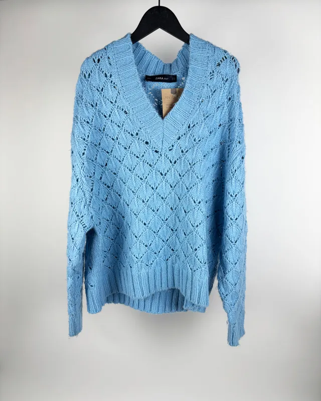 Buzo tejido celeste zara