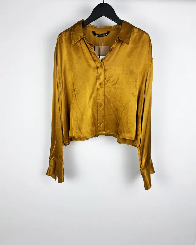 Camisa dorada zara