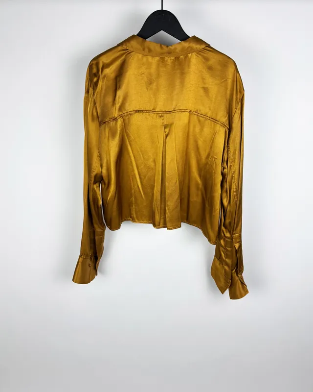 Camisa dorada zara