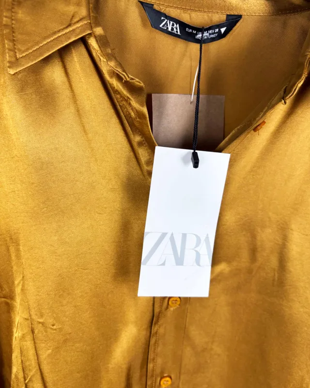 Camisa dorada zara