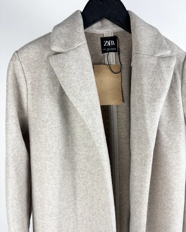 Tapado beige s/botones zara