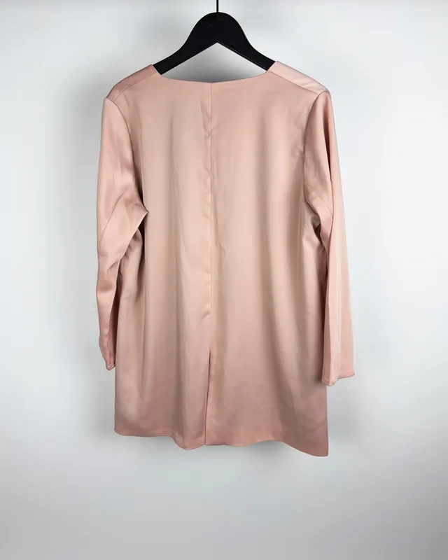Blusa rosa rotunda