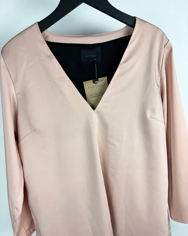 Blusa rosa rotunda