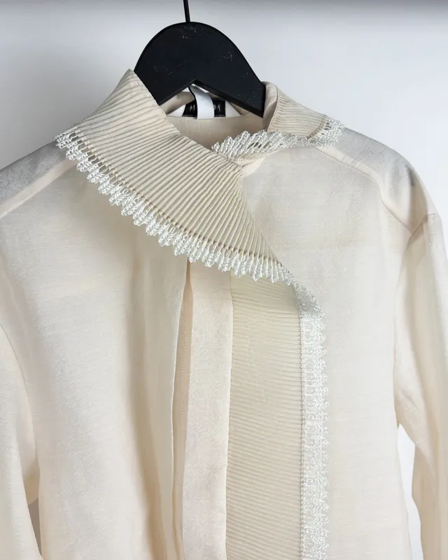 Camisa cruda con volado h&m