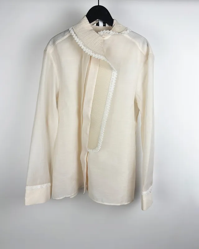 Camisa cruda con volado h&m