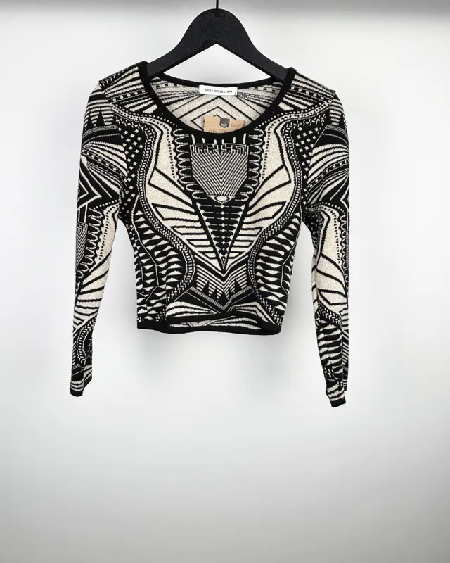 Remera negra dorada hera collection