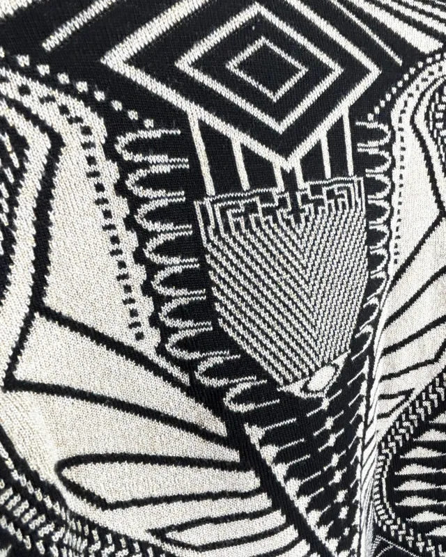 Remera negra dorada hera collection