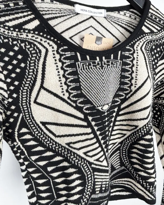 Remera negra dorada hera collection