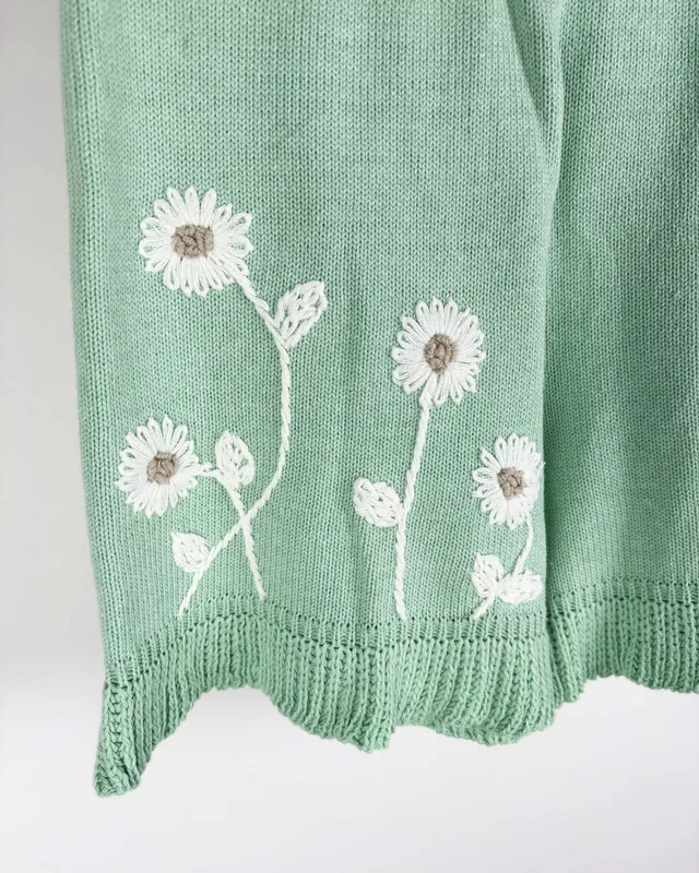 Short  verde agua c/flores perpetua