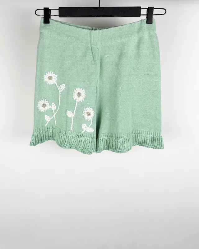 Short  verde agua c/flores perpetua