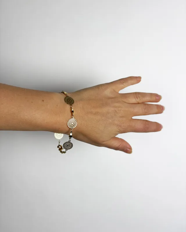 Pulsera fina con redondeles tallados