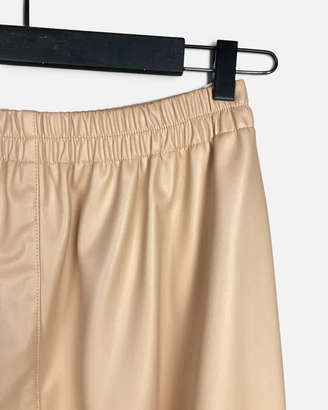 Pollera cuerina rosa zara