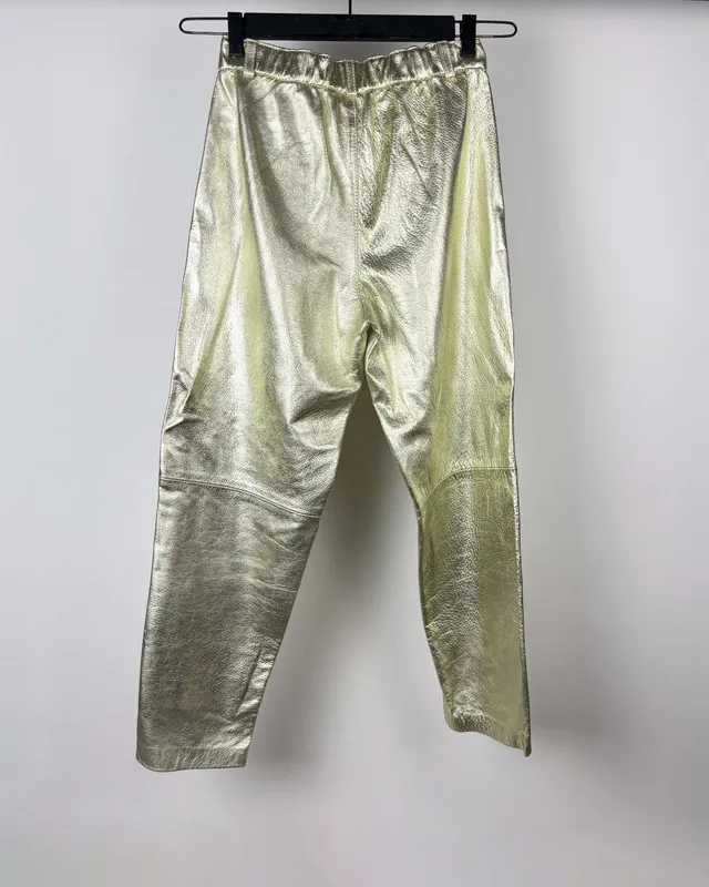 Pantalon dorado zurra