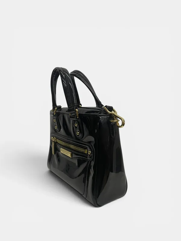 Cartera charol de mano jakie smith