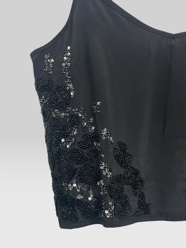 Musculosa lentejuelas negra kosiuko