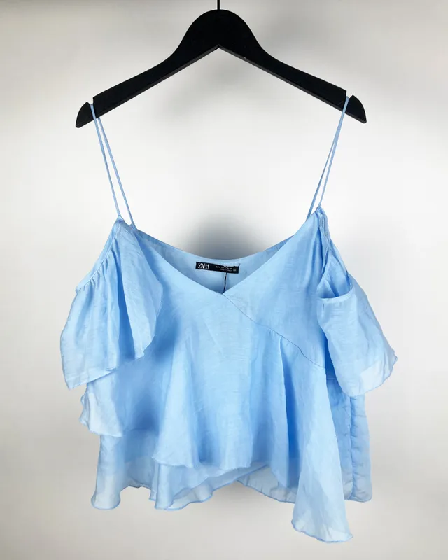 Blusa celeste bf c/volado zara