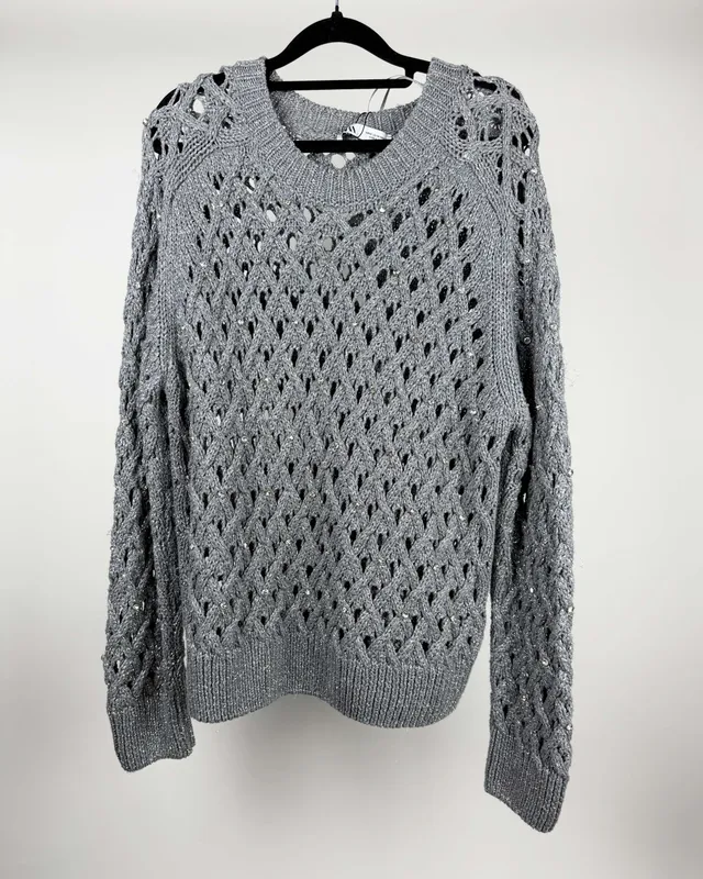 Buzo gris lurex zara