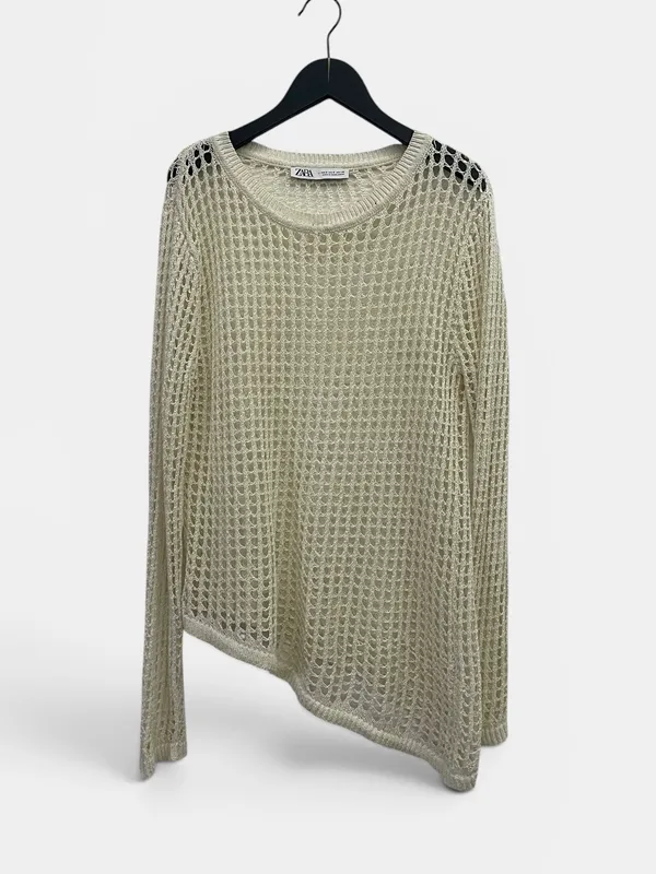 Buzo calado tejido irregular zara