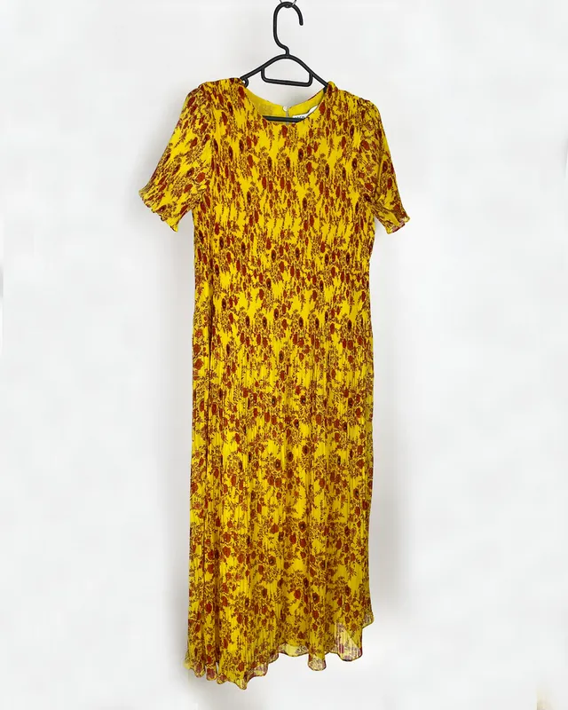 Vestido largo estampado plisado zara