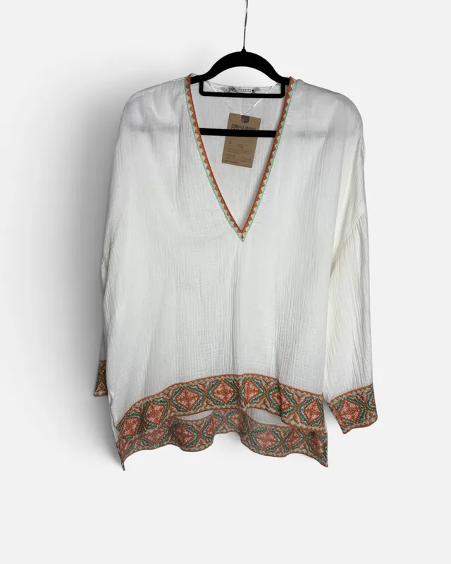 Blusa blanca guarda zara