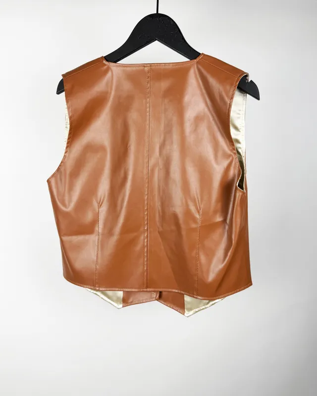 Chaleco marron toca abrigarse
