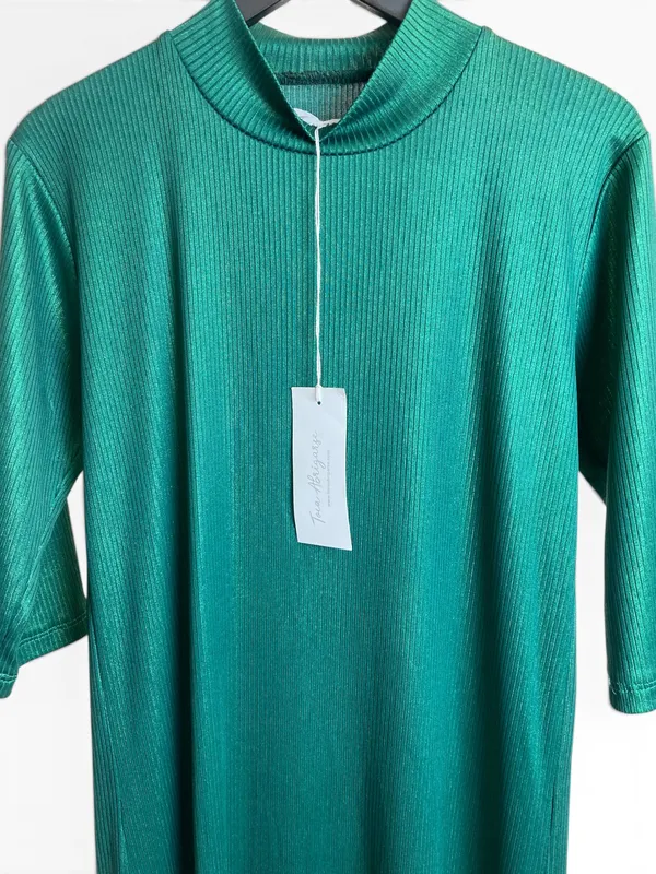 Vestido verde toca abrigarse