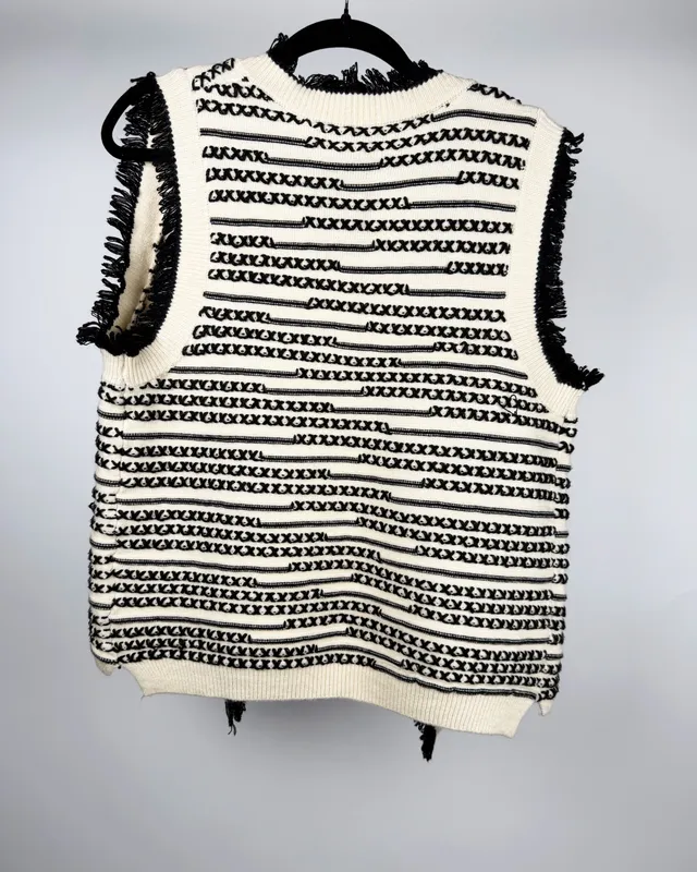 Chaleco natural y negro zng