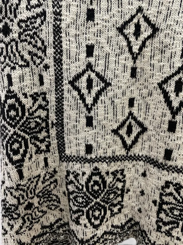 Saco tejido largo con capucha limite