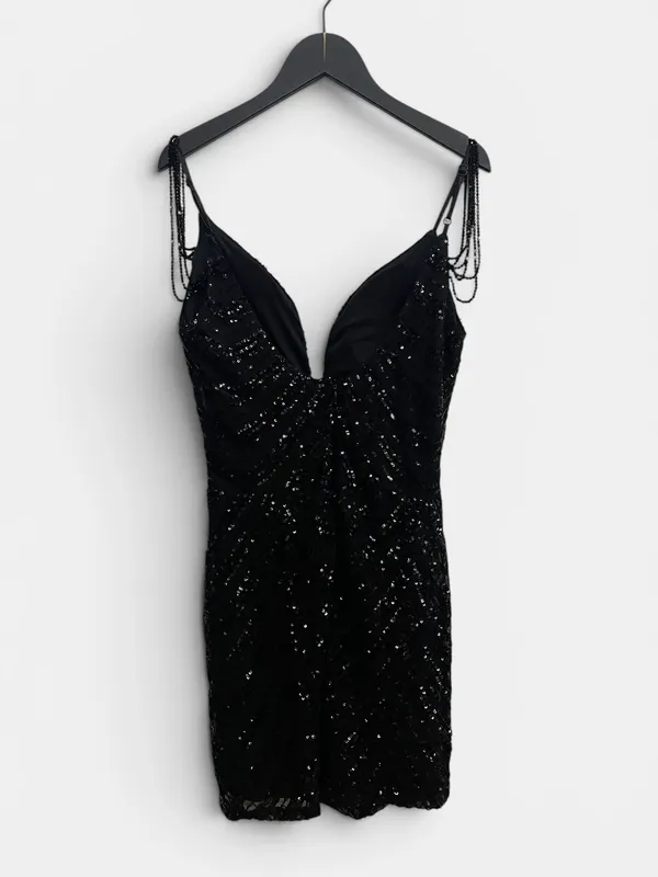 Vestido negro c/canutillos nu wings