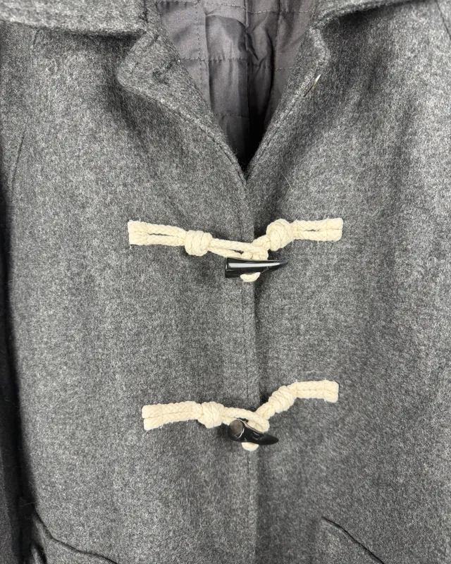 Tapado gris de paño limite