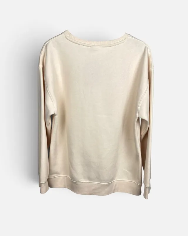 Buzo beige estampado zara