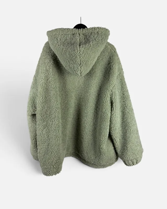Buzo verde peludo caro criado