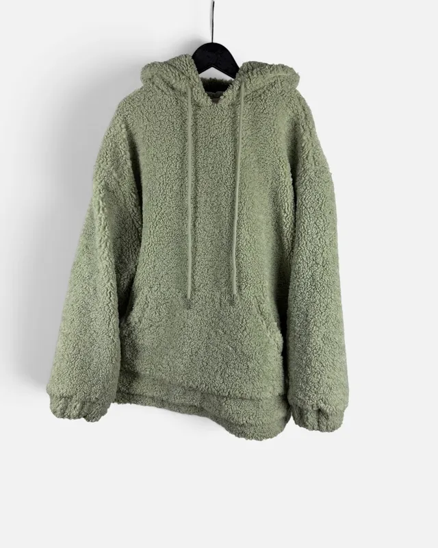 Buzo verde peludo caro criado