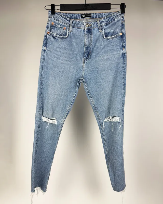 Jean celeste con roturas zara