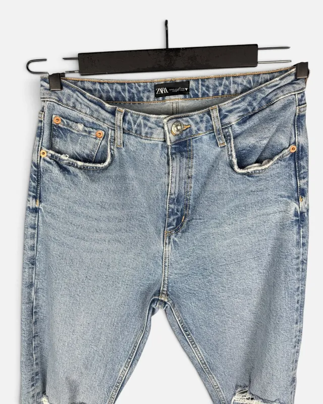 Jean celeste con roturas zara