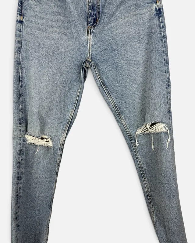 Jean celeste con roturas zara