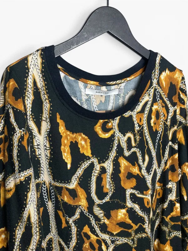 Vestido animal print c/puño maria cher