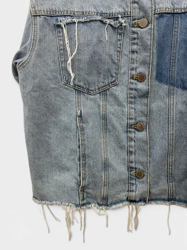 Campera jean sin cuello y terminacion al corte zara